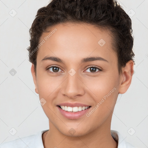 Joyful white young-adult female with short  brown hair and brown eyes