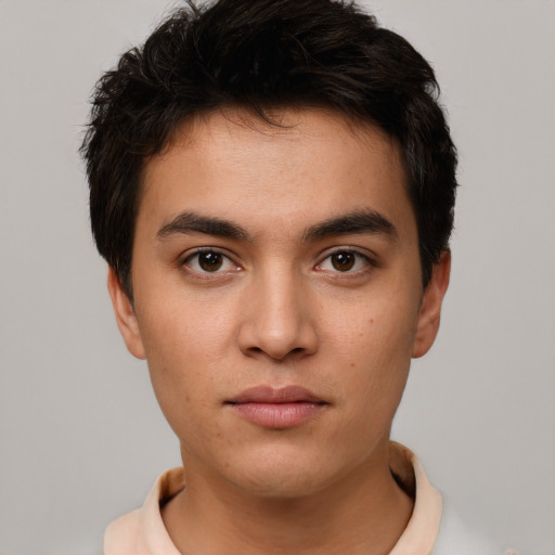 Neutral white young-adult male with short  black hair and brown eyes
