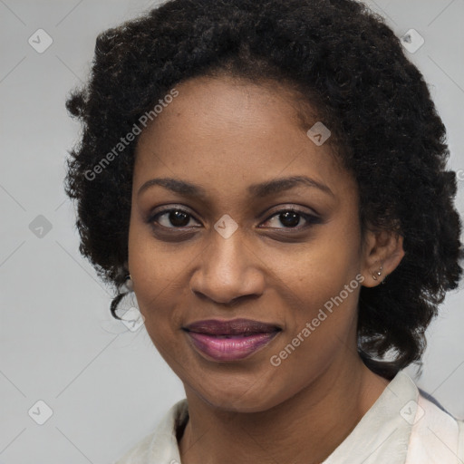 Joyful black young-adult female with medium  black hair and brown eyes