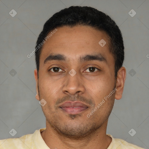 Neutral latino young-adult male with short  black hair and brown eyes