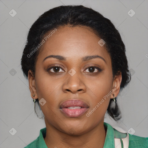 Joyful black young-adult female with medium  brown hair and brown eyes