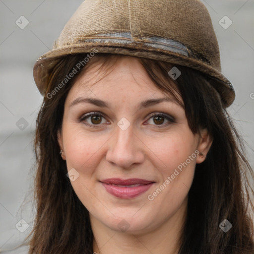 Joyful white adult female with long  brown hair and brown eyes