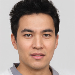 Neutral asian young-adult male with short  brown hair and brown eyes