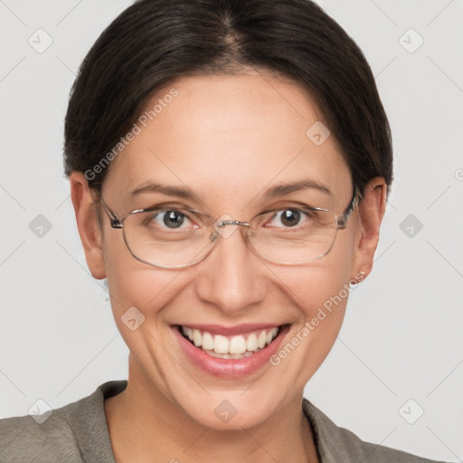 Joyful white adult female with short  brown hair and grey eyes