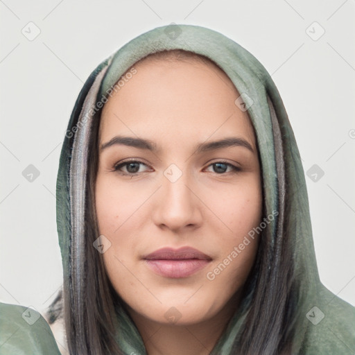 Joyful white young-adult female with long  brown hair and brown eyes