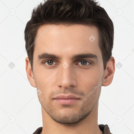 Neutral white young-adult male with short  brown hair and brown eyes