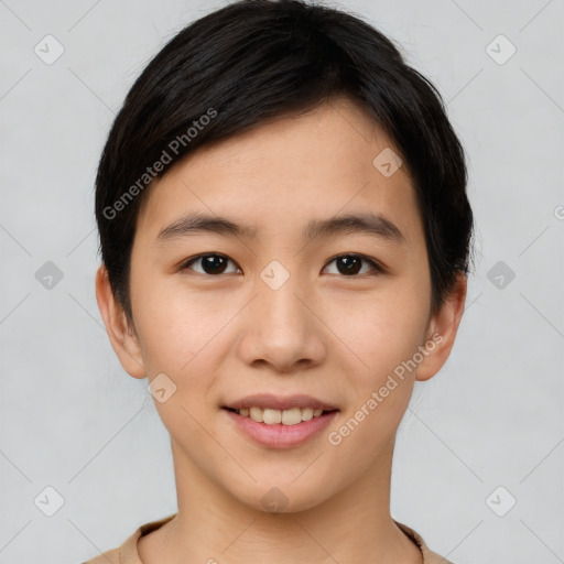 Joyful asian young-adult female with short  brown hair and brown eyes