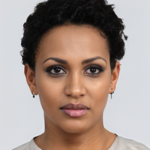 Neutral black young-adult female with short  black hair and brown eyes