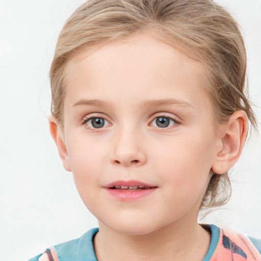 Joyful white child female with medium  brown hair and blue eyes