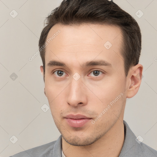 Neutral white young-adult male with short  brown hair and brown eyes