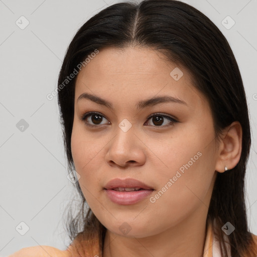 Joyful asian young-adult female with long  brown hair and brown eyes