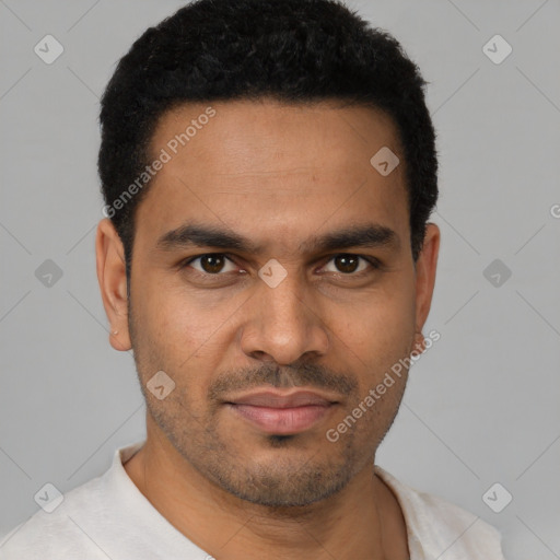 Joyful latino young-adult male with short  black hair and brown eyes