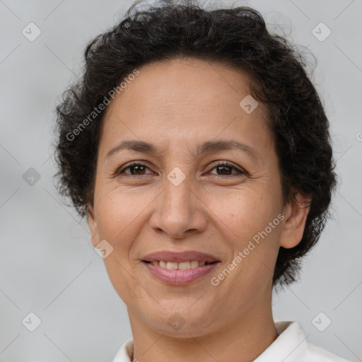 Joyful white adult female with short  brown hair and brown eyes