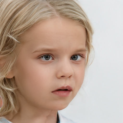 Neutral white child female with medium  blond hair and blue eyes