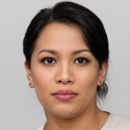 Neutral asian young-adult female with medium  black hair and brown eyes