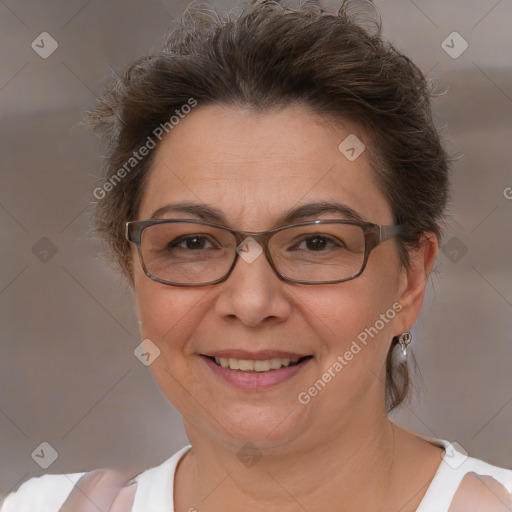 Joyful white adult female with short  brown hair and brown eyes