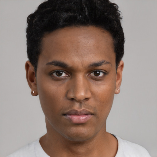 Neutral black young-adult male with short  black hair and brown eyes
