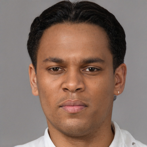 Neutral black young-adult male with short  brown hair and brown eyes