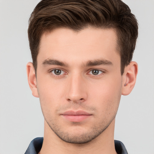 Neutral white young-adult male with short  brown hair and brown eyes