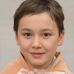 Joyful white child female with short  brown hair and brown eyes