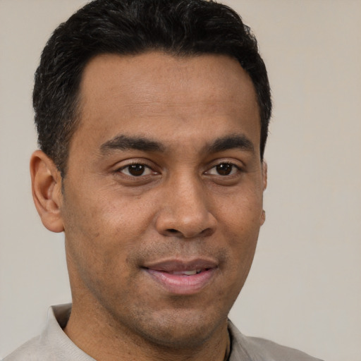 Neutral latino young-adult male with short  brown hair and brown eyes