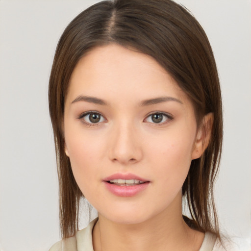 Neutral white young-adult female with medium  brown hair and brown eyes