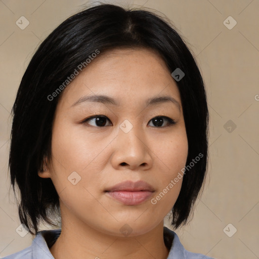 Joyful asian young-adult female with medium  black hair and brown eyes