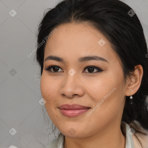 Joyful asian young-adult female with medium  brown hair and brown eyes