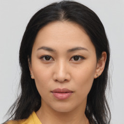 Neutral asian young-adult female with medium  brown hair and brown eyes