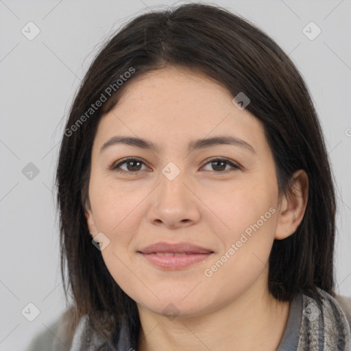 Joyful white young-adult female with medium  brown hair and brown eyes