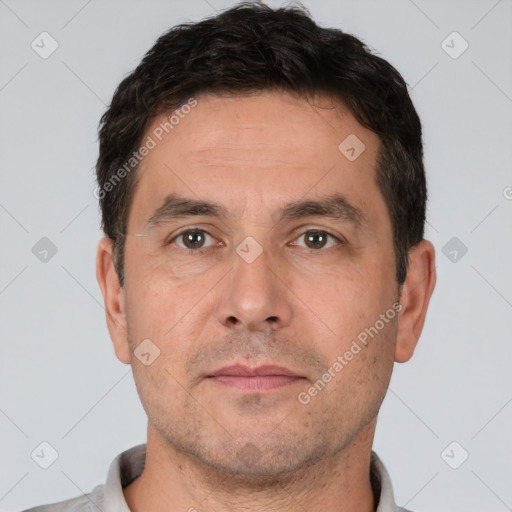 Neutral white adult male with short  brown hair and brown eyes