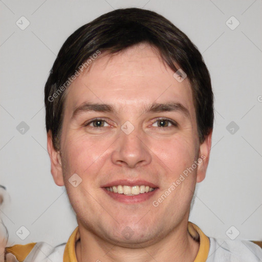 Joyful white young-adult male with short  brown hair and brown eyes