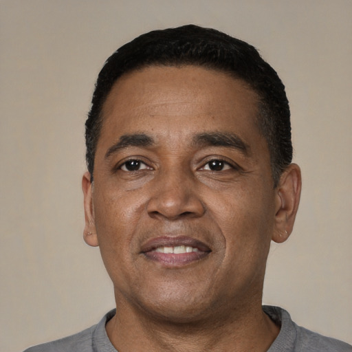 Neutral latino adult male with short  black hair and brown eyes