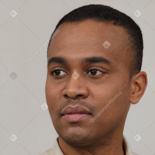 Neutral black young-adult male with short  black hair and brown eyes