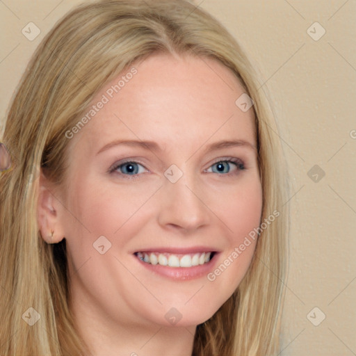 Joyful white young-adult female with long  brown hair and blue eyes