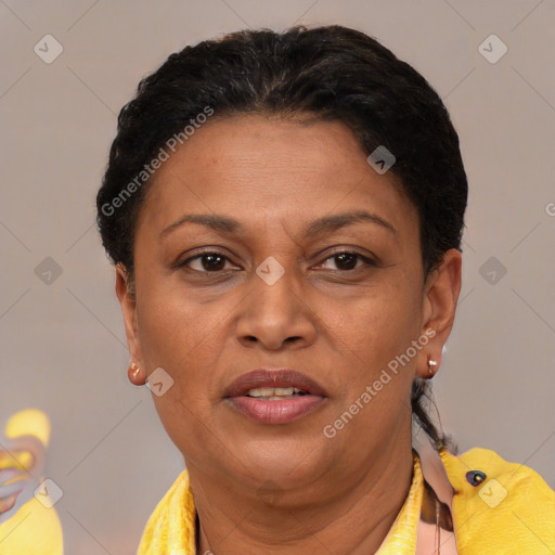 Joyful latino adult female with short  brown hair and brown eyes