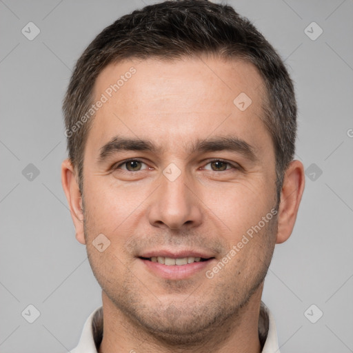 Joyful white young-adult male with short  brown hair and brown eyes