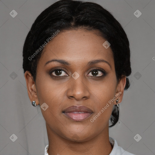 Joyful latino young-adult female with short  brown hair and brown eyes