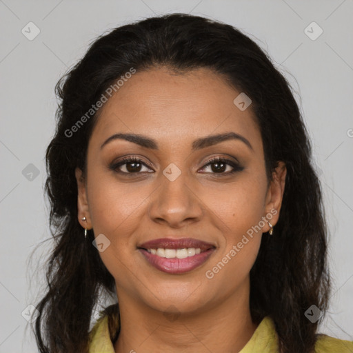 Joyful latino young-adult female with long  brown hair and brown eyes