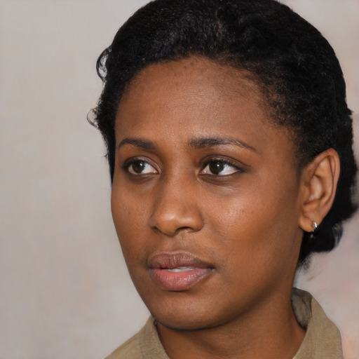 Neutral black young-adult female with short  black hair and brown eyes