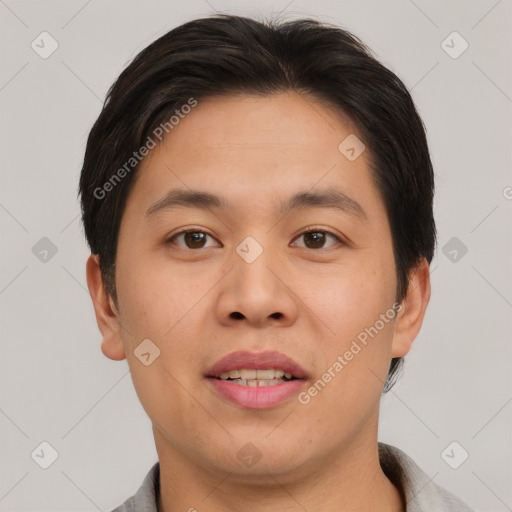 Joyful asian young-adult male with short  brown hair and brown eyes