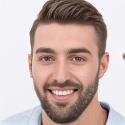 Joyful white young-adult male with short  brown hair and brown eyes