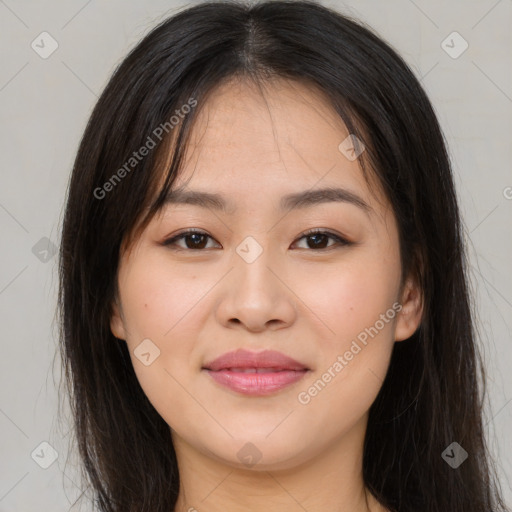 Joyful asian young-adult female with long  brown hair and brown eyes