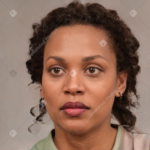 Neutral black young-adult female with medium  brown hair and brown eyes