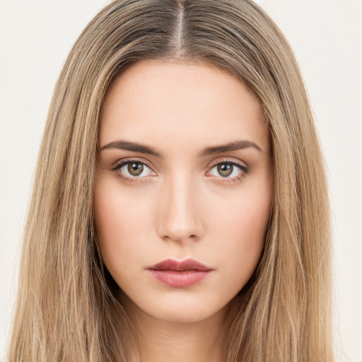 Neutral white young-adult female with long  brown hair and brown eyes