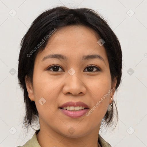 Joyful asian young-adult female with medium  brown hair and brown eyes