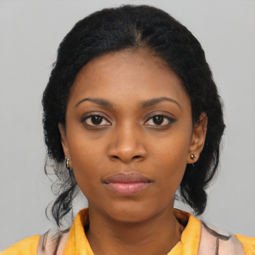 Neutral black young-adult female with medium  black hair and brown eyes