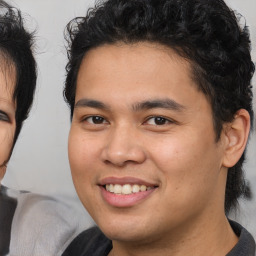 Joyful white young-adult male with medium  brown hair and brown eyes