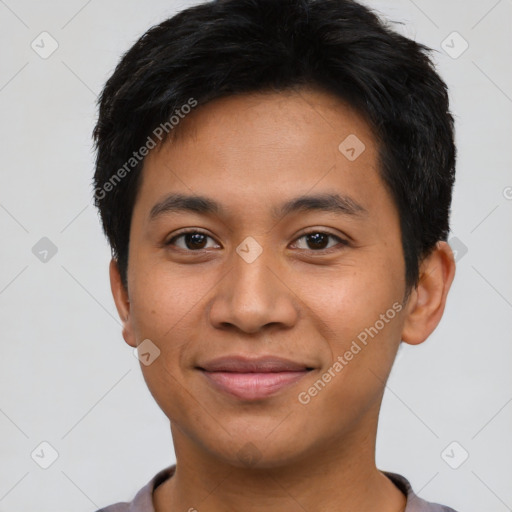 Joyful asian young-adult male with short  black hair and brown eyes