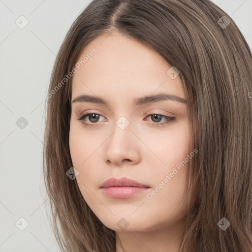 Neutral white young-adult female with long  brown hair and brown eyes